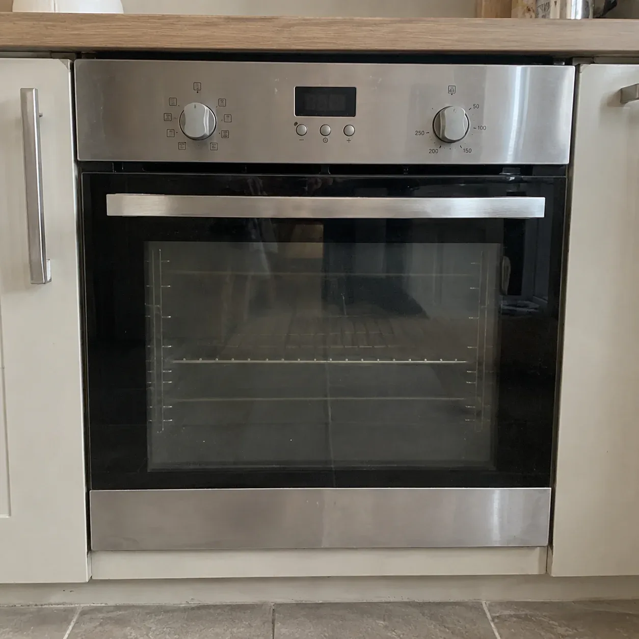 Open oven with visible racks